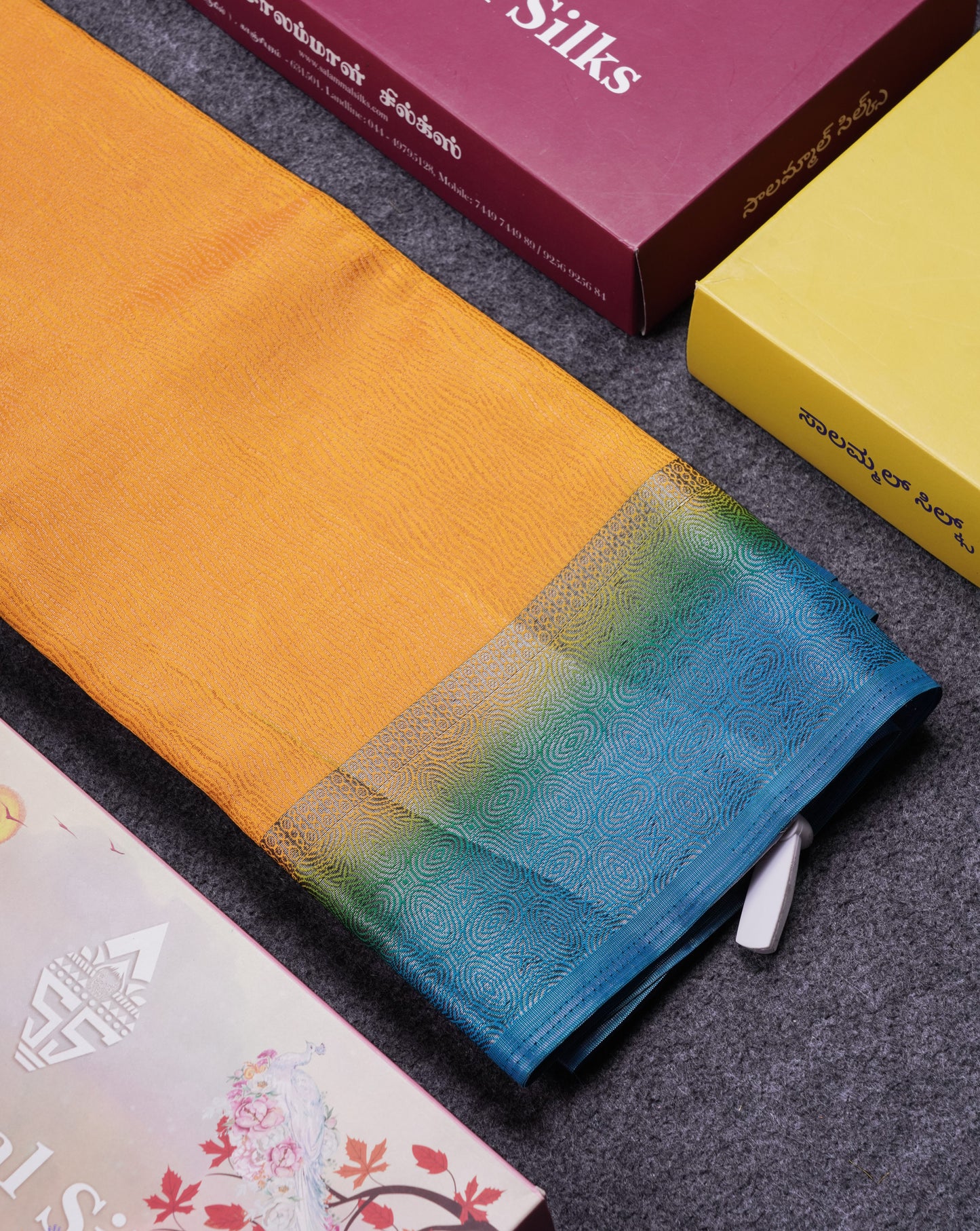 Beautiful Yellow Semi Raw Silk Fancy Saree With Contrast Blue Border