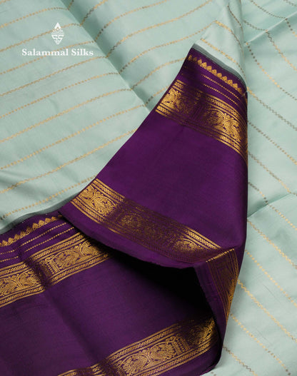 Korvai Beautiful Ice Blue Pure Kanjivaram Silk Saree With Contrast Dark Purple Traditional Rettapet Border