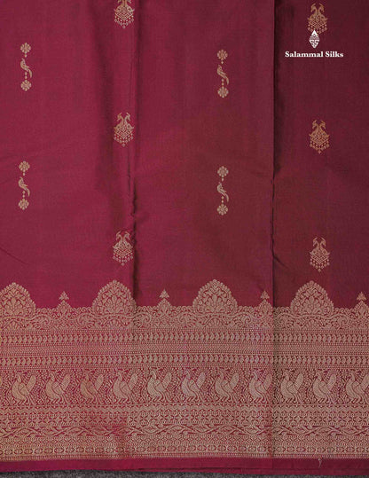 Beautiful Dual Tone Magenta Iruthalai Pakshi Zari Butta Semi Silk Saree With Traditional Turning Border