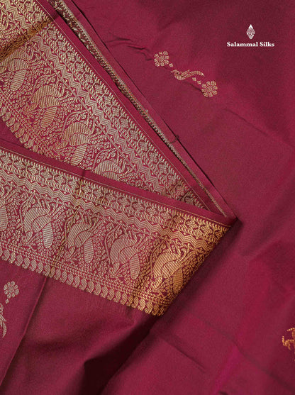 Beautiful Dual Tone Magenta Iruthalai Pakshi Zari Butta Semi Silk Saree With Traditional Turning Border