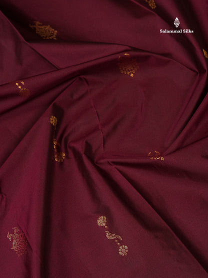 Beautiful Dual Tone Magenta Iruthalai Pakshi Zari Butta Semi Silk Saree With Traditional Turning Border