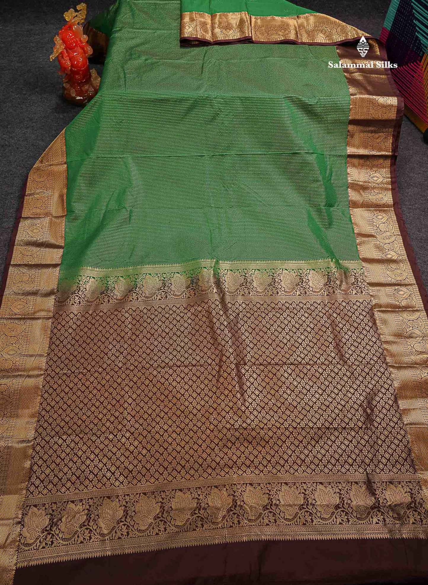 Beautiful Bottle Green Zari Lines Semi Silk Saree With Contrast Dark Brown Traditional Border
