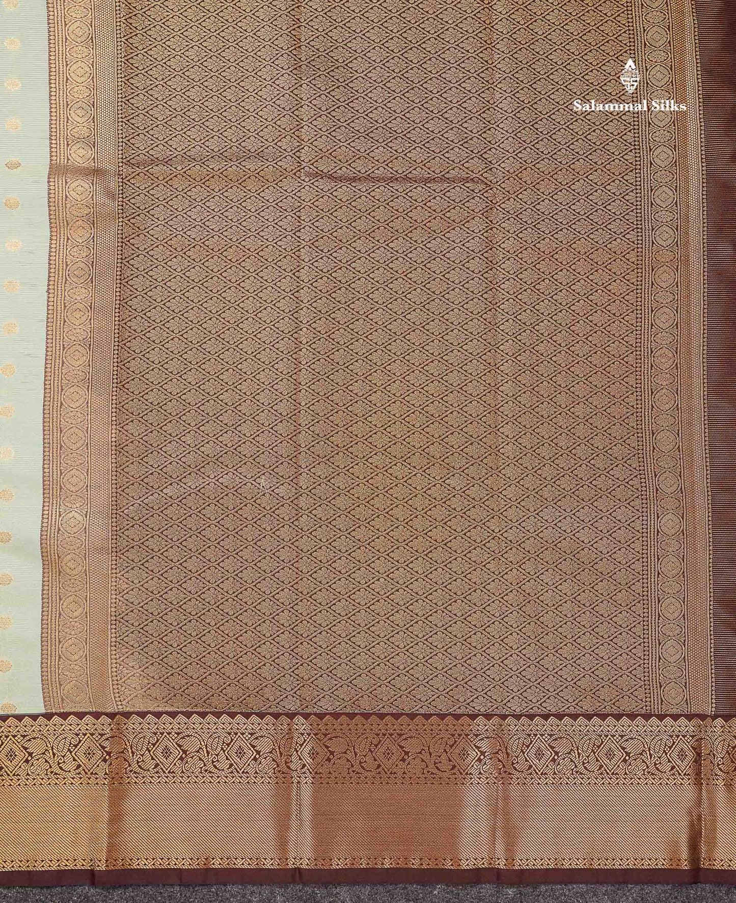 Beautiful Light Elaichi Green Vaira Oosi Lines With Traditional Buttas Semi Silk Saree With Contrast Dark Brown Border