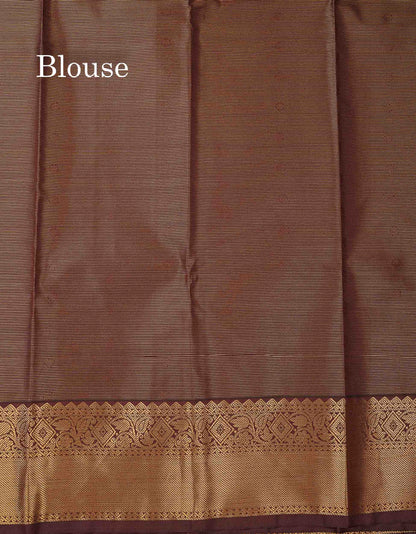Beautiful Light Elaichi Green Vaira Oosi Lines With Traditional Buttas Semi Silk Saree With Contrast Dark Brown Border
