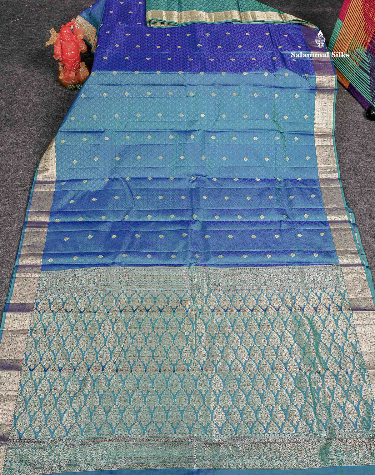 Pure Kanjivaram Silk Saree - Peacock Blue Colour Body Zari Buttas With Medium Border 