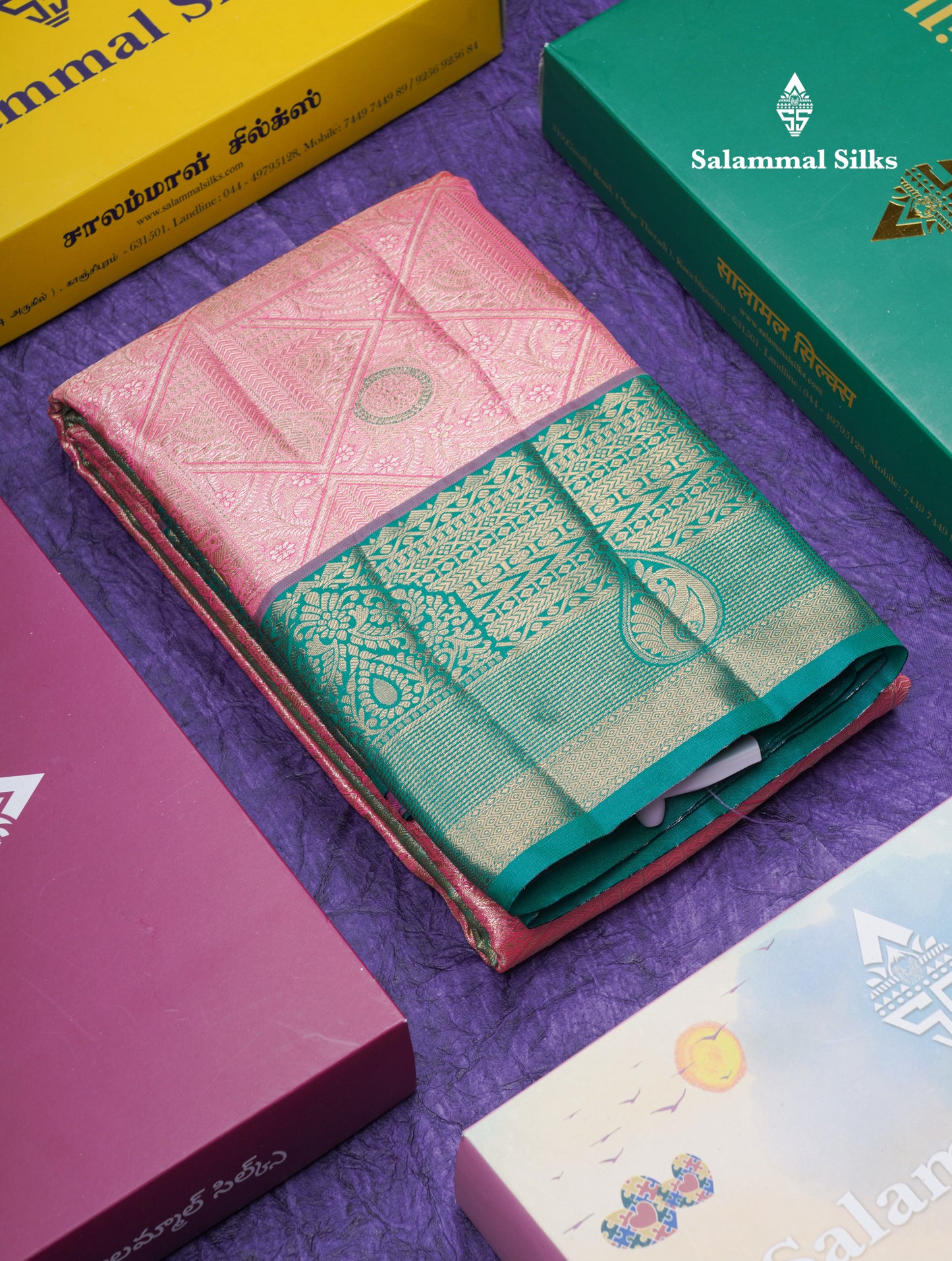 Dark Peach Geometric Pattern Tissue Bridal Semi Silk Saree With Contrast Peacock Green Traditional Border