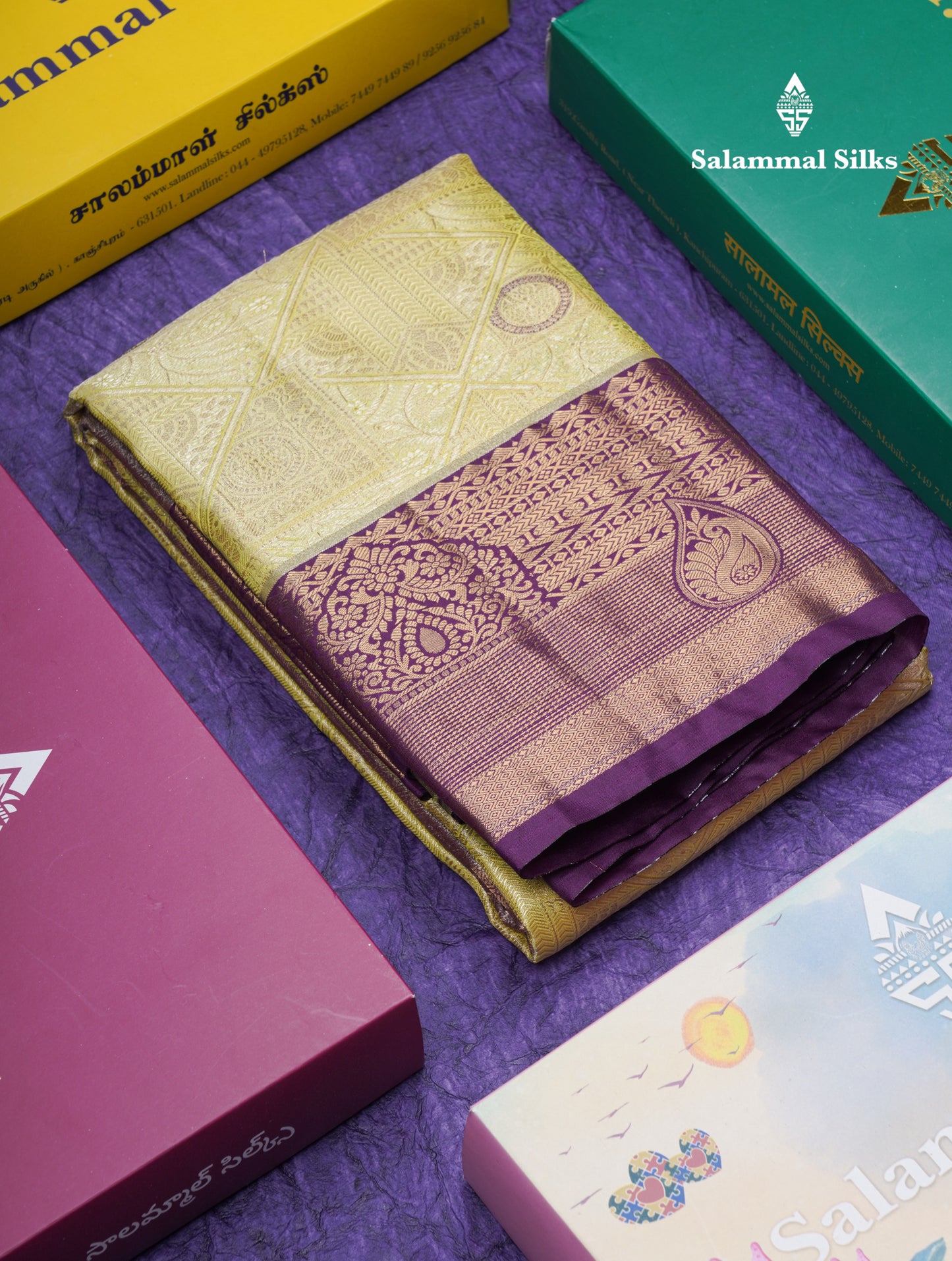 Lavender Geometric Pattern Tissue Bridal Semi Silk Saree With Contrast Peacock Green Traditional Border