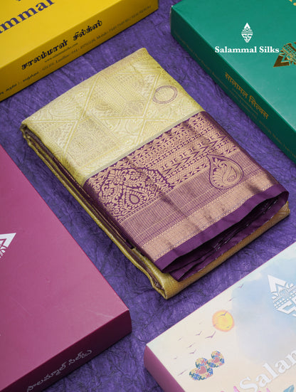 Lavender Geometric Pattern Tissue Bridal Semi Silk Saree With Contrast Peacock Green Traditional Border