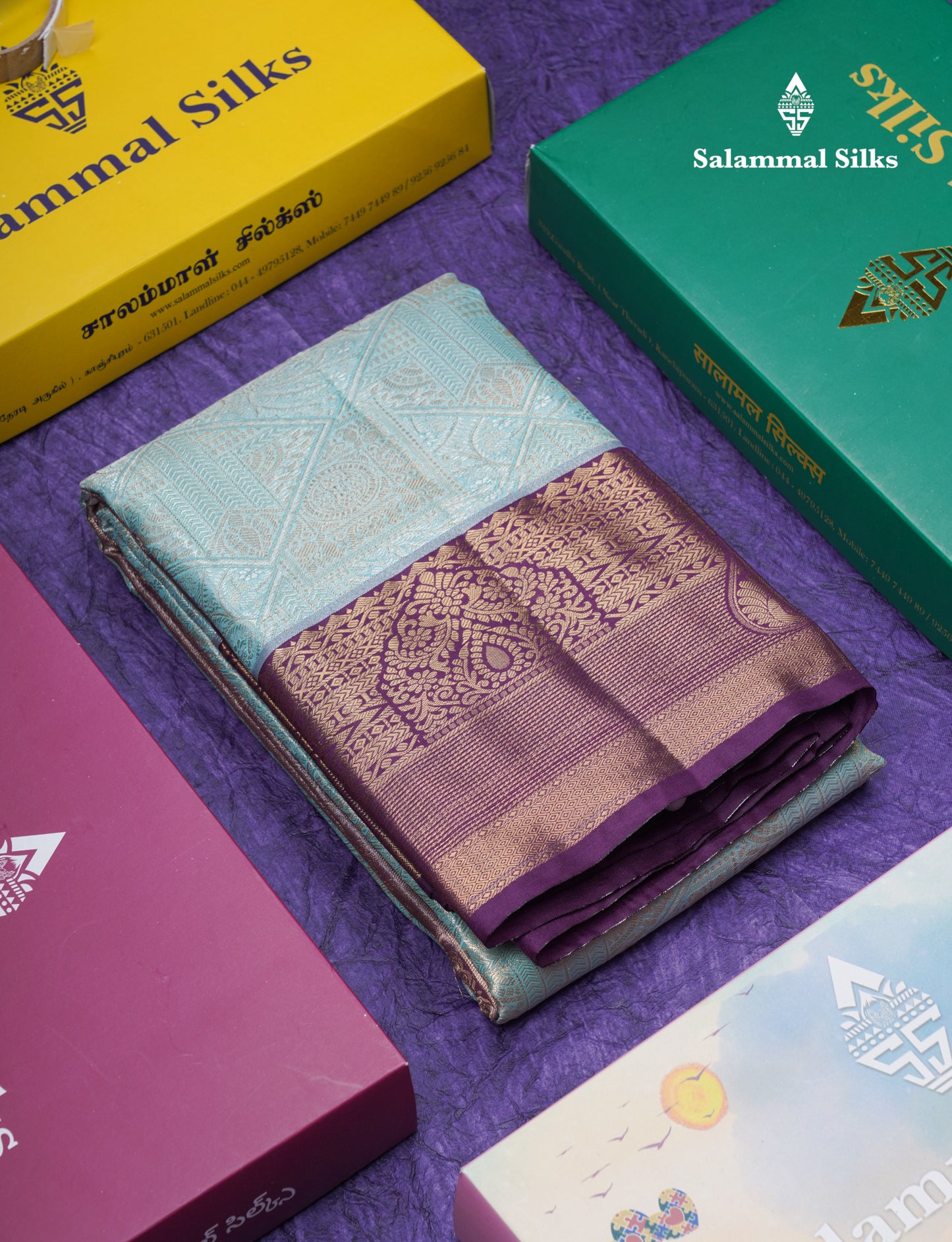 Lavender Geometric Pattern Tissue Bridal Semi Silk Saree With Contrast Peacock Green Traditional Border