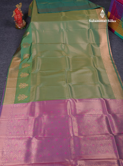 Beautiful Dual Tone Pink Semi Silk Saree With Contrast Peacock Green Blouse