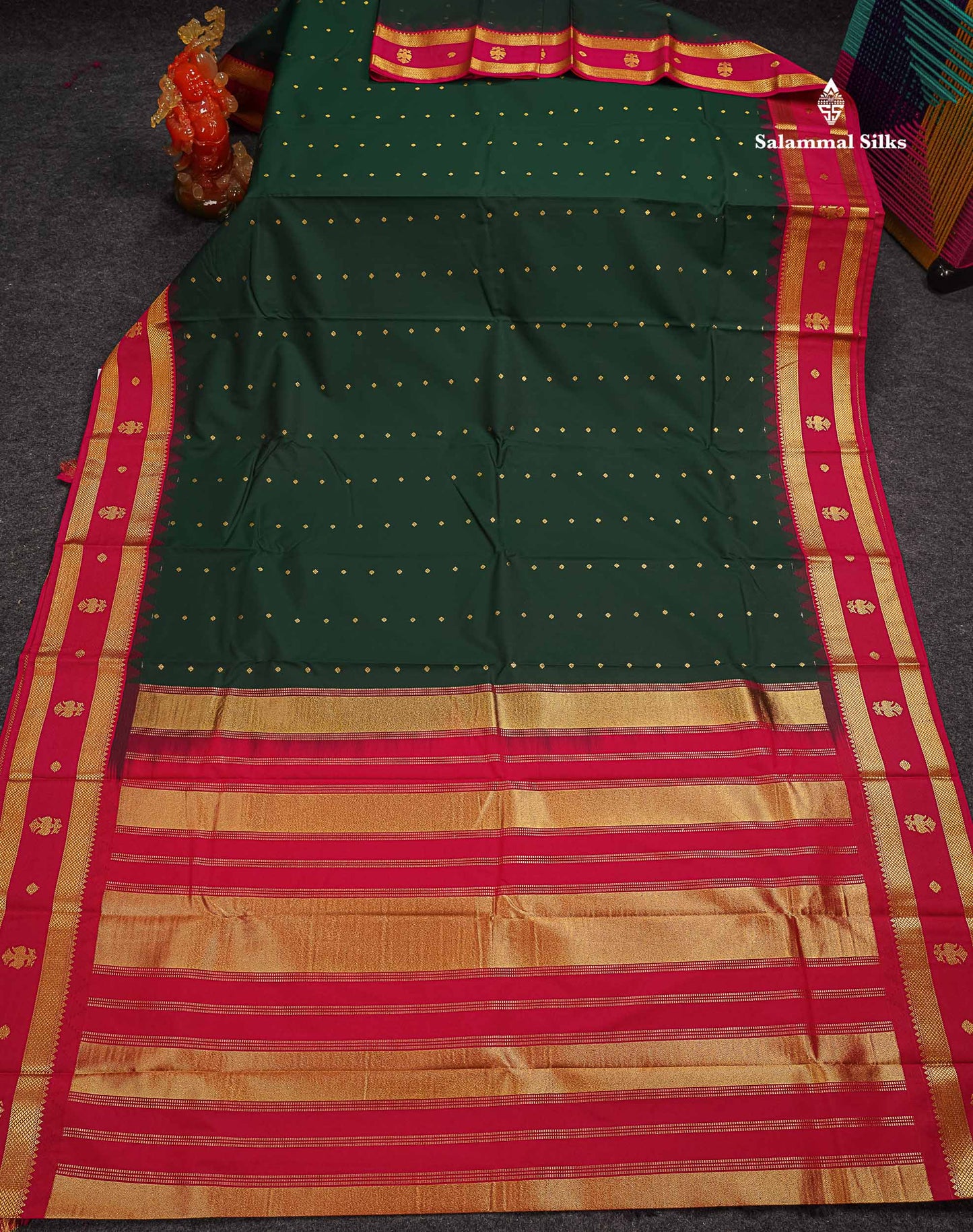 Beautiful Bottle Green Small Zari Buttas Semi Silk Saree With Contrast Pink Traditional Iruthalai Pakshi Gap Border