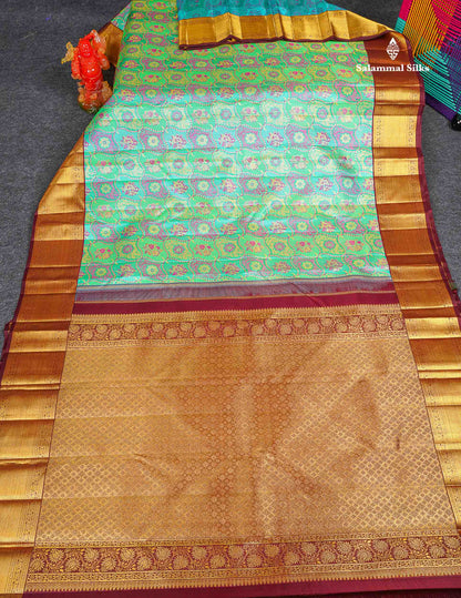 Korvai 2G Zari Kanjivaram Silk Saree - Sapphire Green Colour Body With Contrast Dark Brown Border 