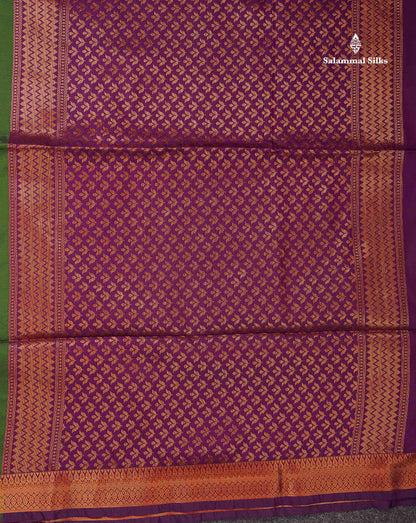 Beautiful Bottle Green Copper Zari Butta Semi Soft Silk Saree With Contrast Dark Purple Blouse