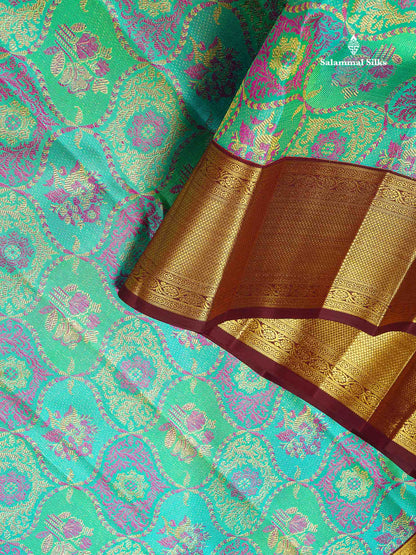Korvai 2G Zari Kanjivaram Silk Saree - Sapphire Green Colour Body With Contrast Dark Brown Border