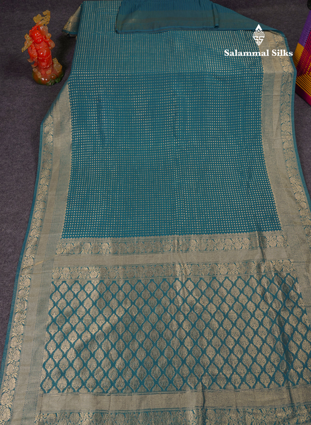 Beautiful Peacock Green Semi Georgette Saree With Fancy Border