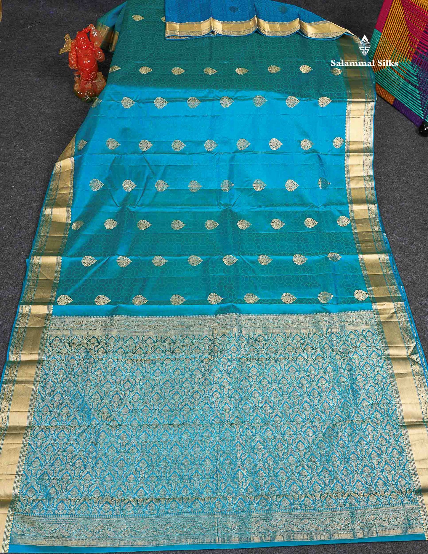 Pure Kanjivaram Silk Saree - Peacock  Blue Colour Body Zari Butta With Medium Border