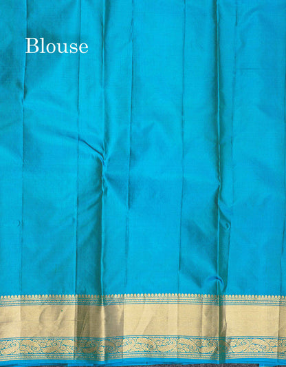Pure Kanjivaram Silk Saree - Anandha Blue Colour Body Zari Butta With Medium Border