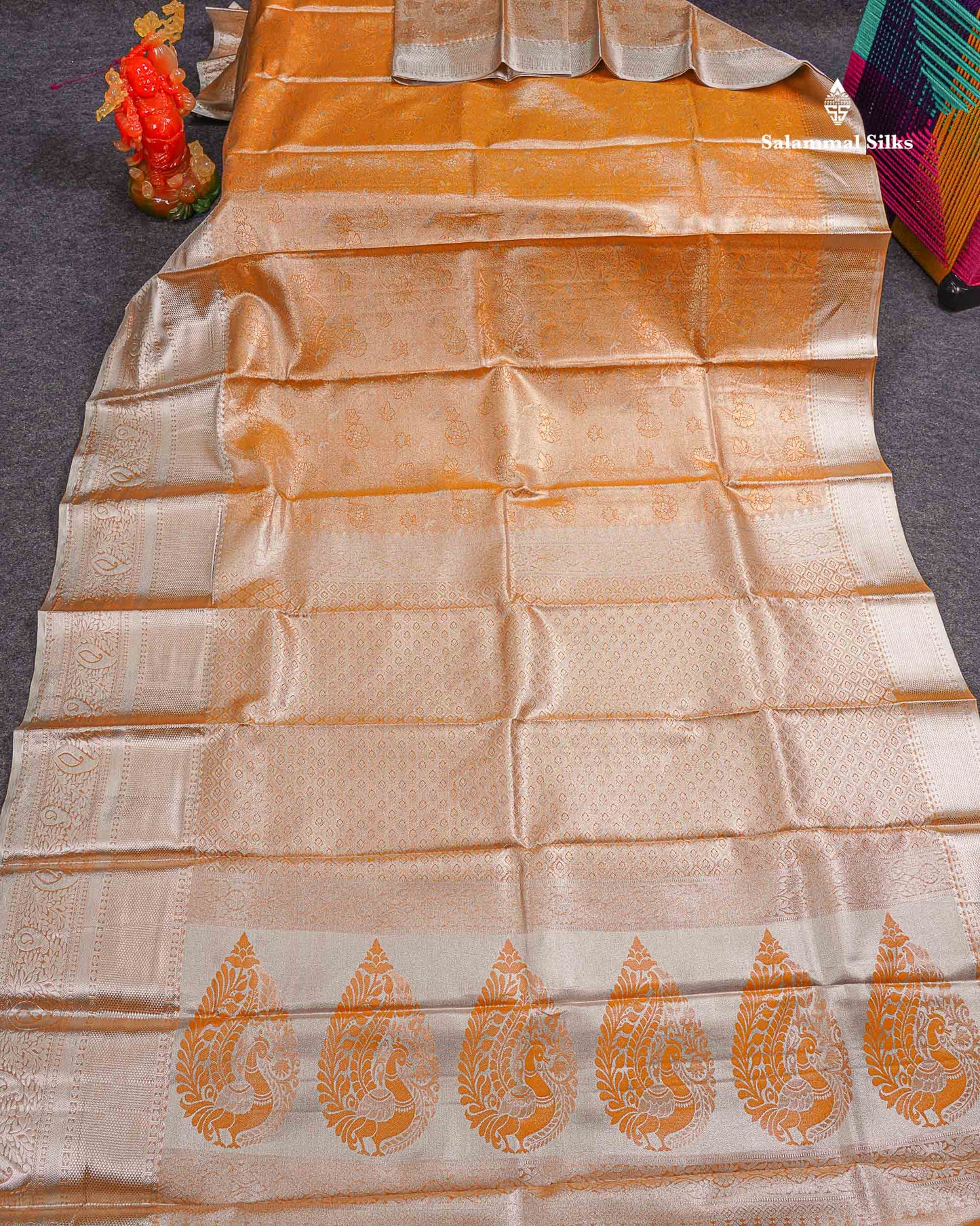 Beautiful Light Orange Tissue Bridal Semi Silk Saree With Traditional Evening Morning Border