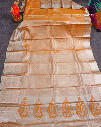 Beautiful Light Orange Tissue Bridal Semi Silk Saree With Traditional Evening Morning Border