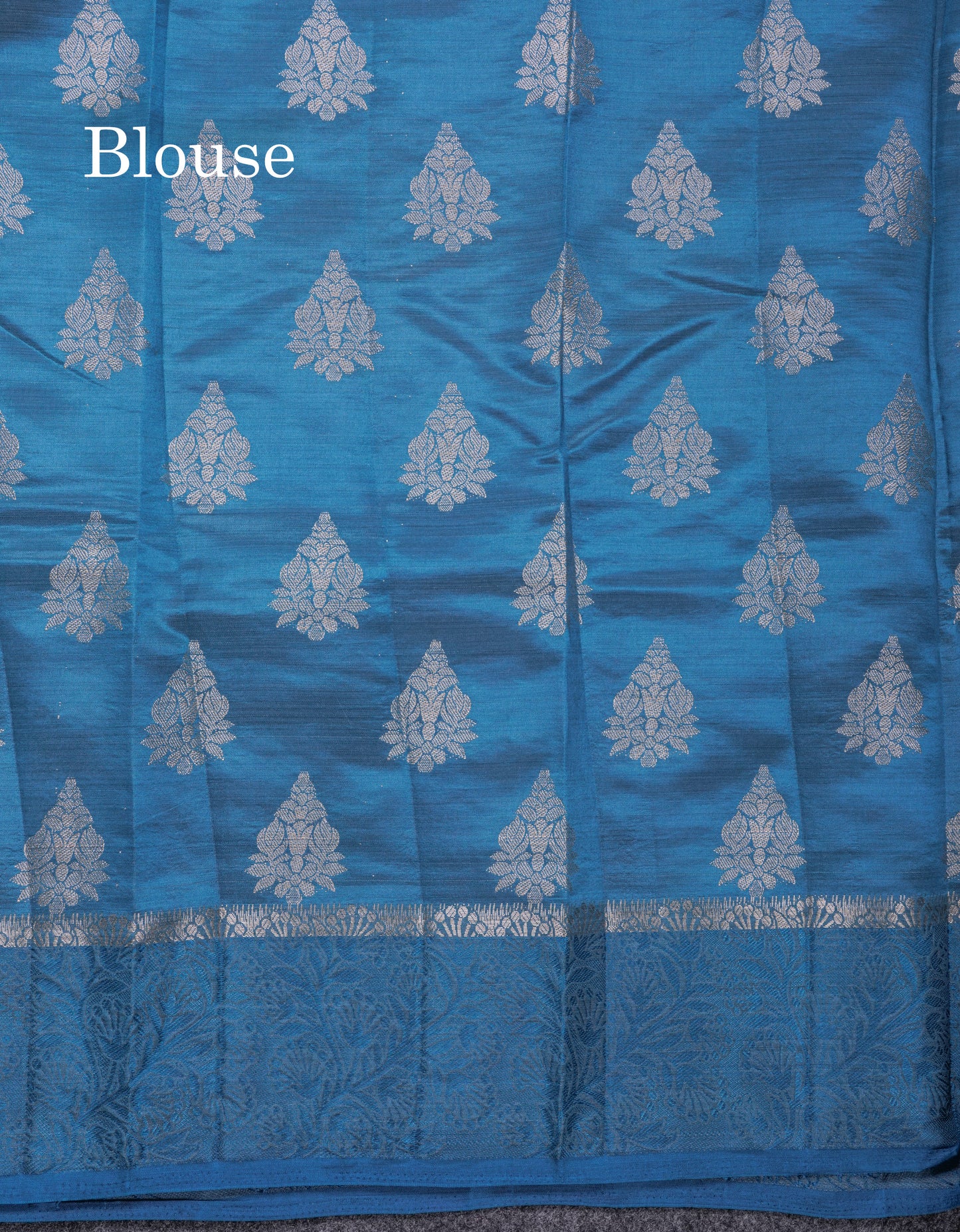 Beautiful Blue Semi Raw Silk Saree With Fancy Border
