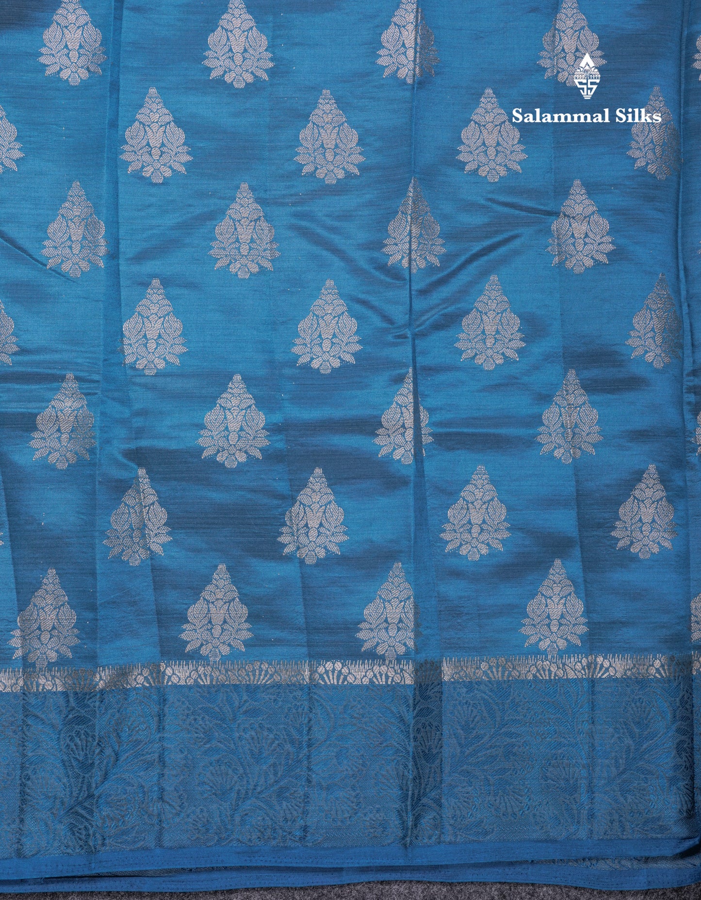 Beautiful Blue Semi Raw Silk Saree With Fancy Border