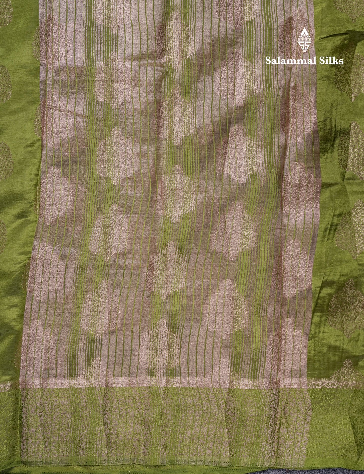 Beautiful Green Semi Raw Silk Saree With Fancy Border