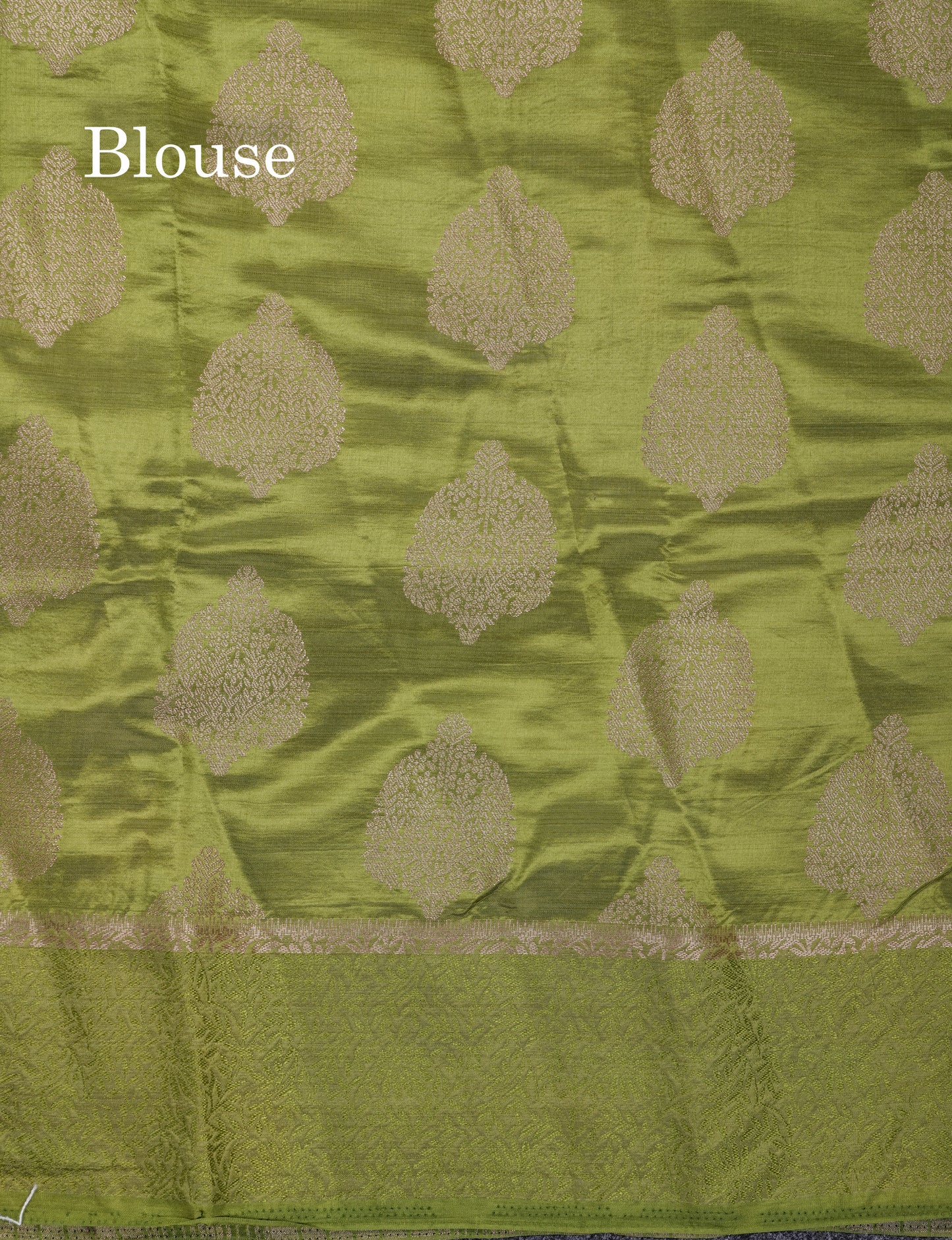 Beautiful Green Semi Raw Silk Saree With Fancy Border
