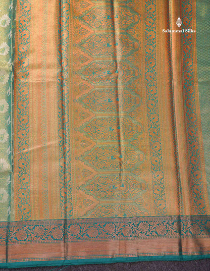 Beautiful Light Green Tissue Bridal Semi Silk Saree With Peacock Green Traditional Border