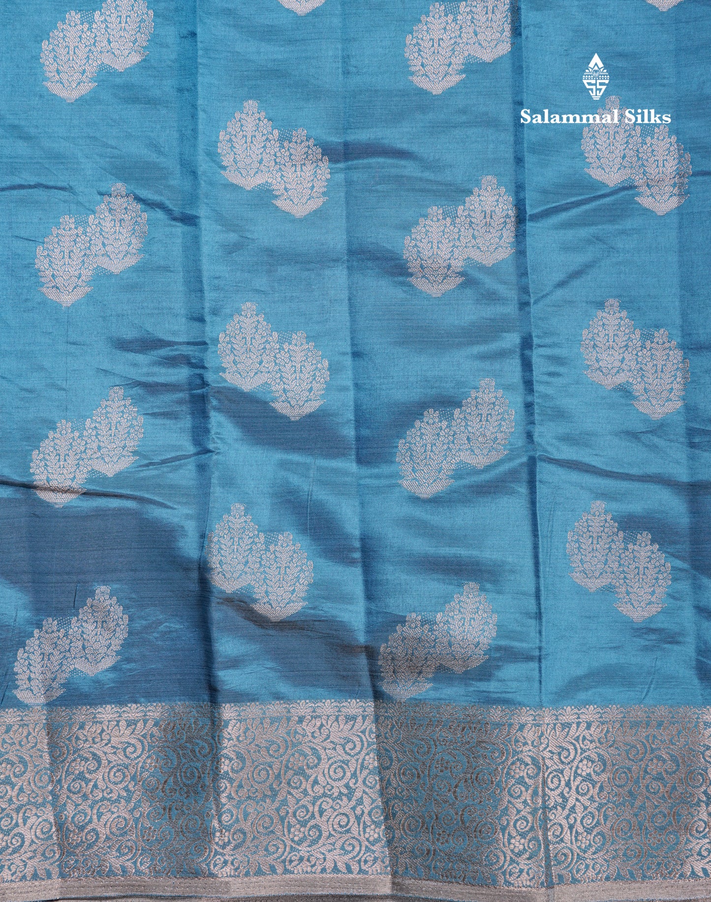 Beautiful Blue Semi Raw Silk Saree With Fancy Border