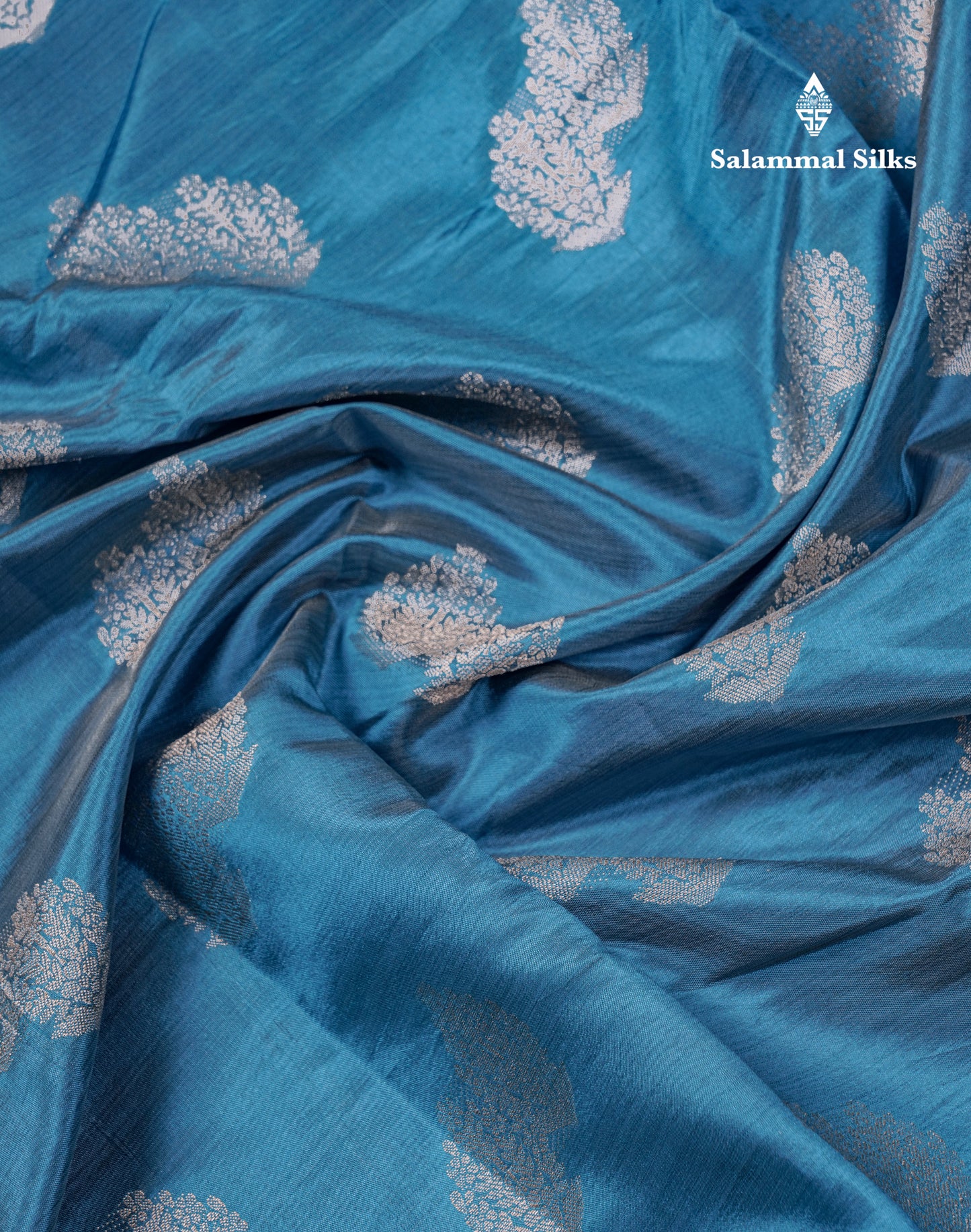Beautiful Blue Semi Raw Silk Saree With Fancy Border