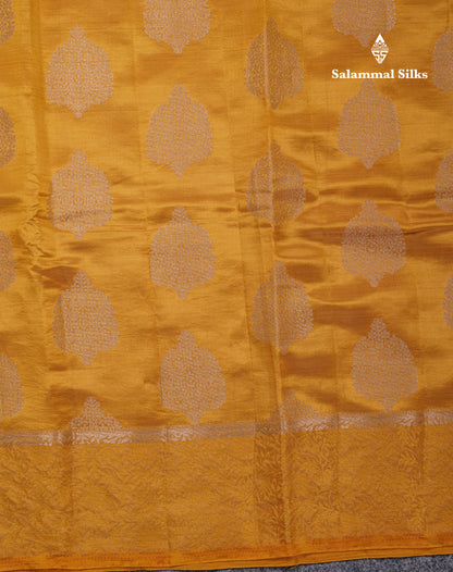 Beautiful Green Semi Raw Silk Saree With Fancy Border