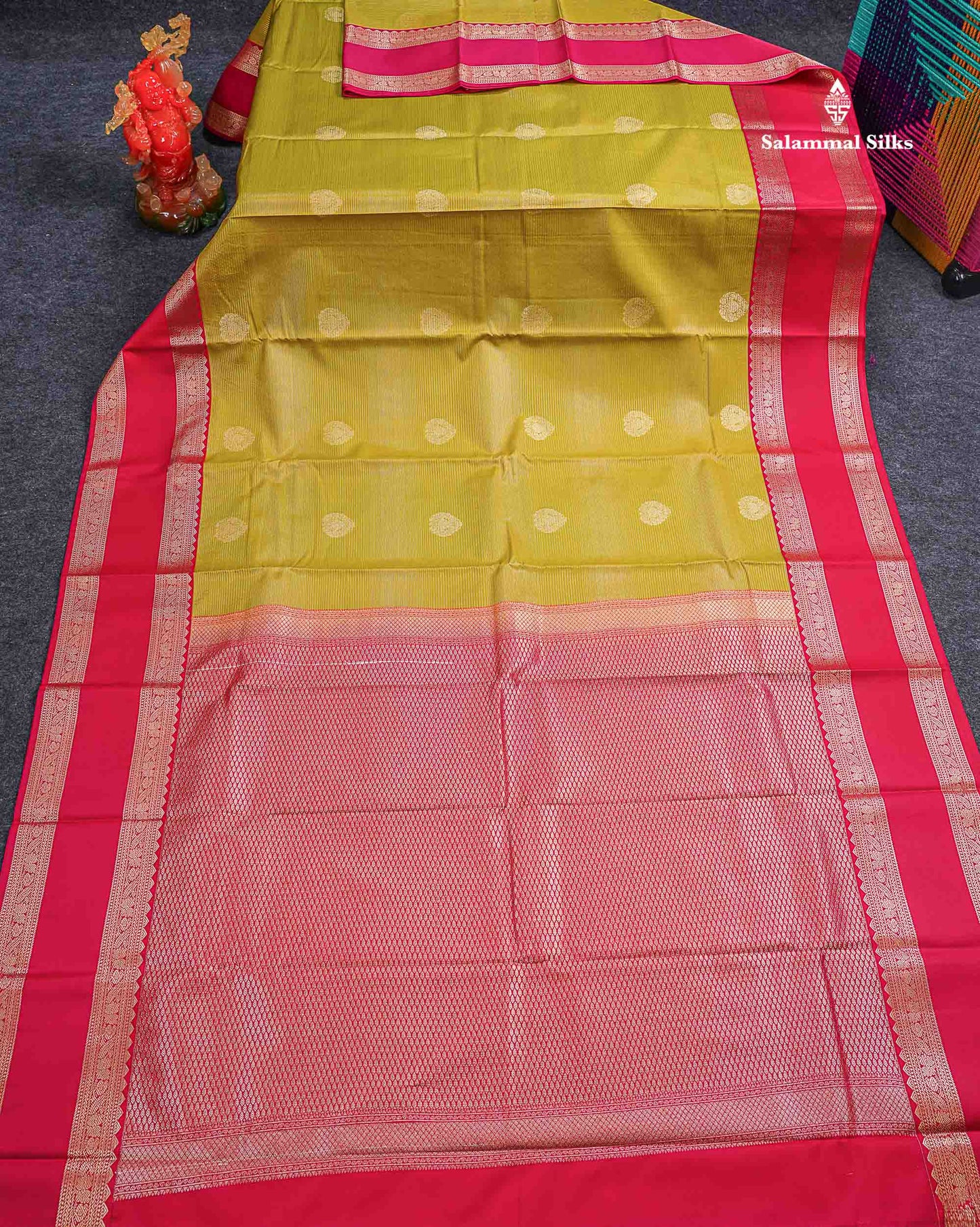 Beautiful Manthulir Yellow Alai Vaira Oosi Lines With Butta Semi Silk Saree With Contrast Pink Traditional Gap Border