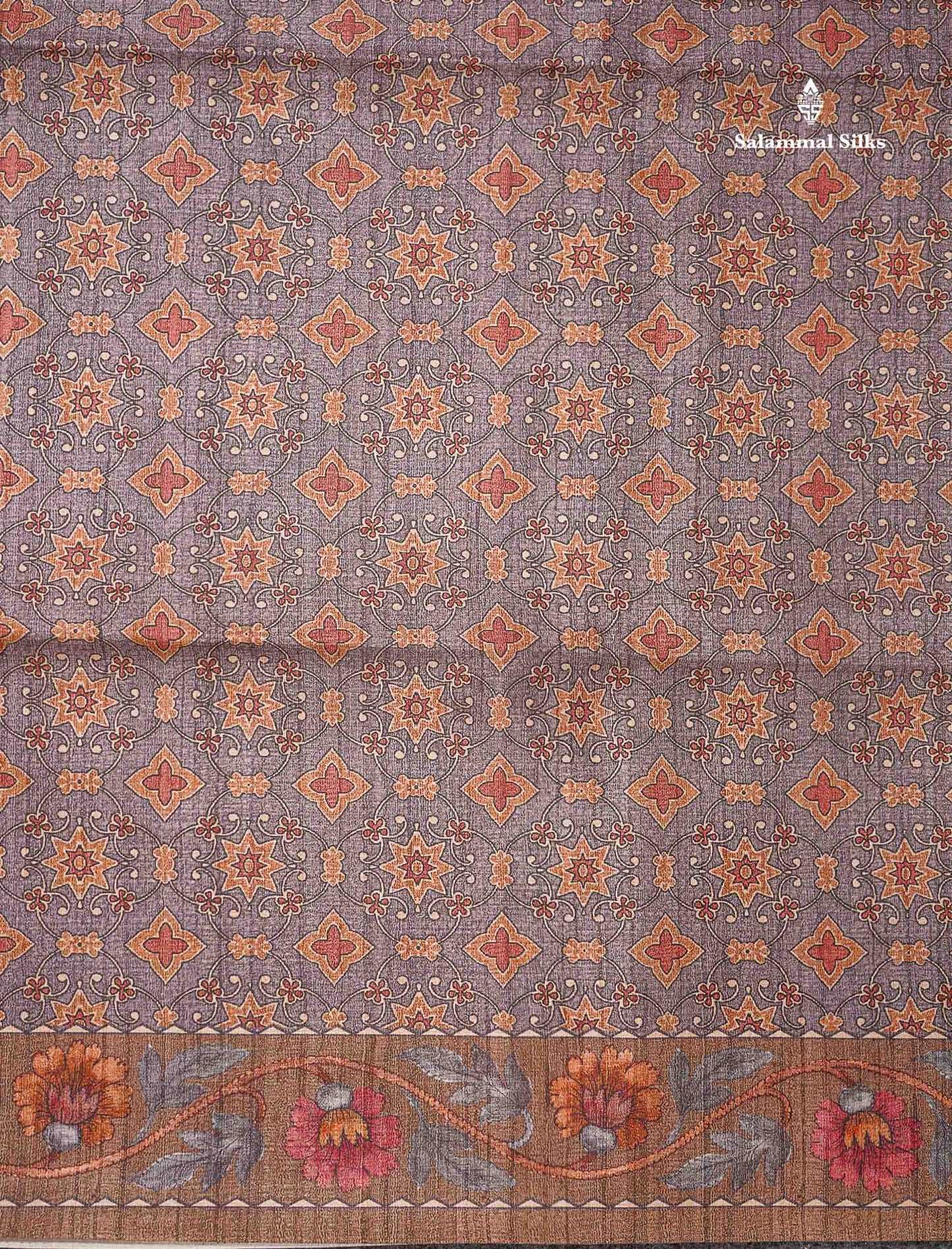 Beautiful Light Grey Semi Tussar Saree With Contrast Brown Floral Design Blouse
