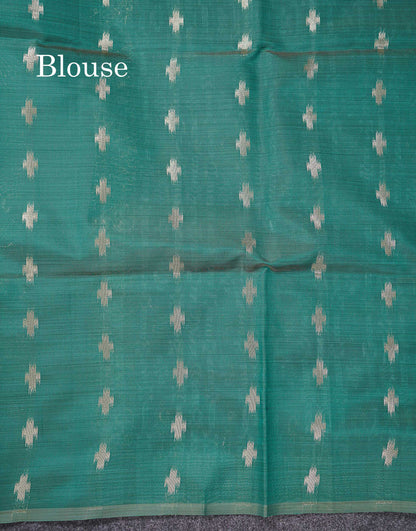 Elegant Cream Sandal Ikkat Style Cotton Mix Saree With Contrast Peacock Blue Border