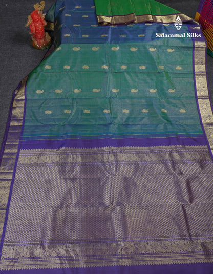 Beautiful Dual Tone Peacock Green Vaira Oosi Checks And Butta Mango & Peacock Butta Pure Kanjivaram Silk Saree With Contrast Navy Blue Traditional Medium Border
