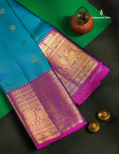 Pure Kanjivaram Silk Saree - Peacock Blue Colour Body With Butta & Contrast Vadamalli Long Border
