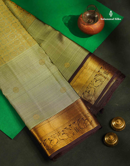 Pure Kanjivaram Silk Saree - Olive Green Colour Body With Butta & Contrast Brown Traditional Border