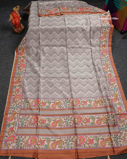 Beautiful Light Grey Wave Design Semi Tussar Fancy Saree With Contrast Brown Blouse