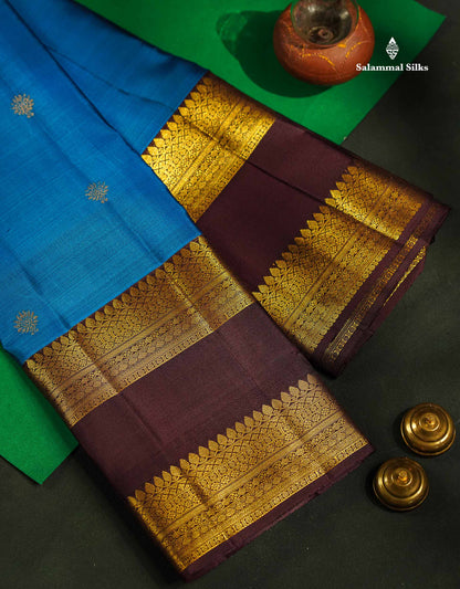 Pure Kanjivaram Silk Saree - Blue Colour Body Butta With Contrast Dark Brown Traditional Gap Border