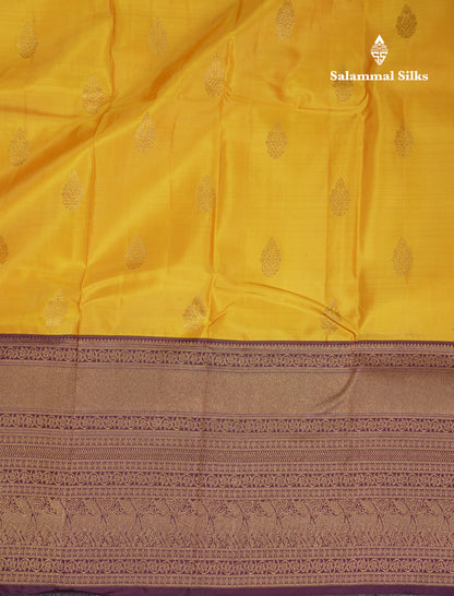 Beautiful Yellow Pure Kanjivaram Silk Saree With Contrast Dark Purple Traditional Evening Morning Border