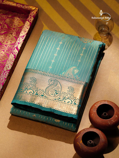 Beautiful Dual Tone Onion Pink Vertical Zari Line With Butta Semi Silk Saree With Contrast Light Blue Blouse