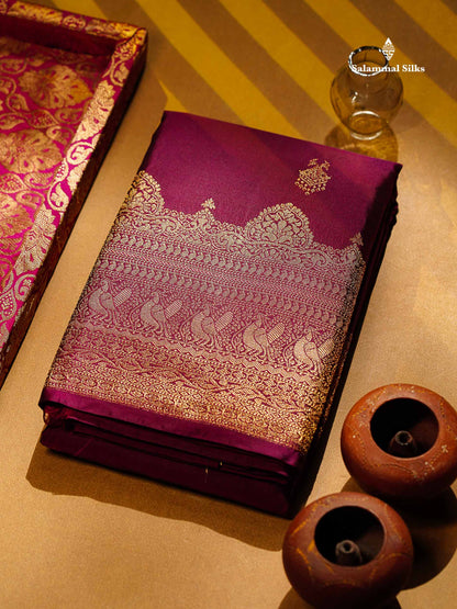 Beautiful Dual Tone Magenta Iruthalai Pakshi Zari Butta Semi Silk Saree With Traditional Turning Border