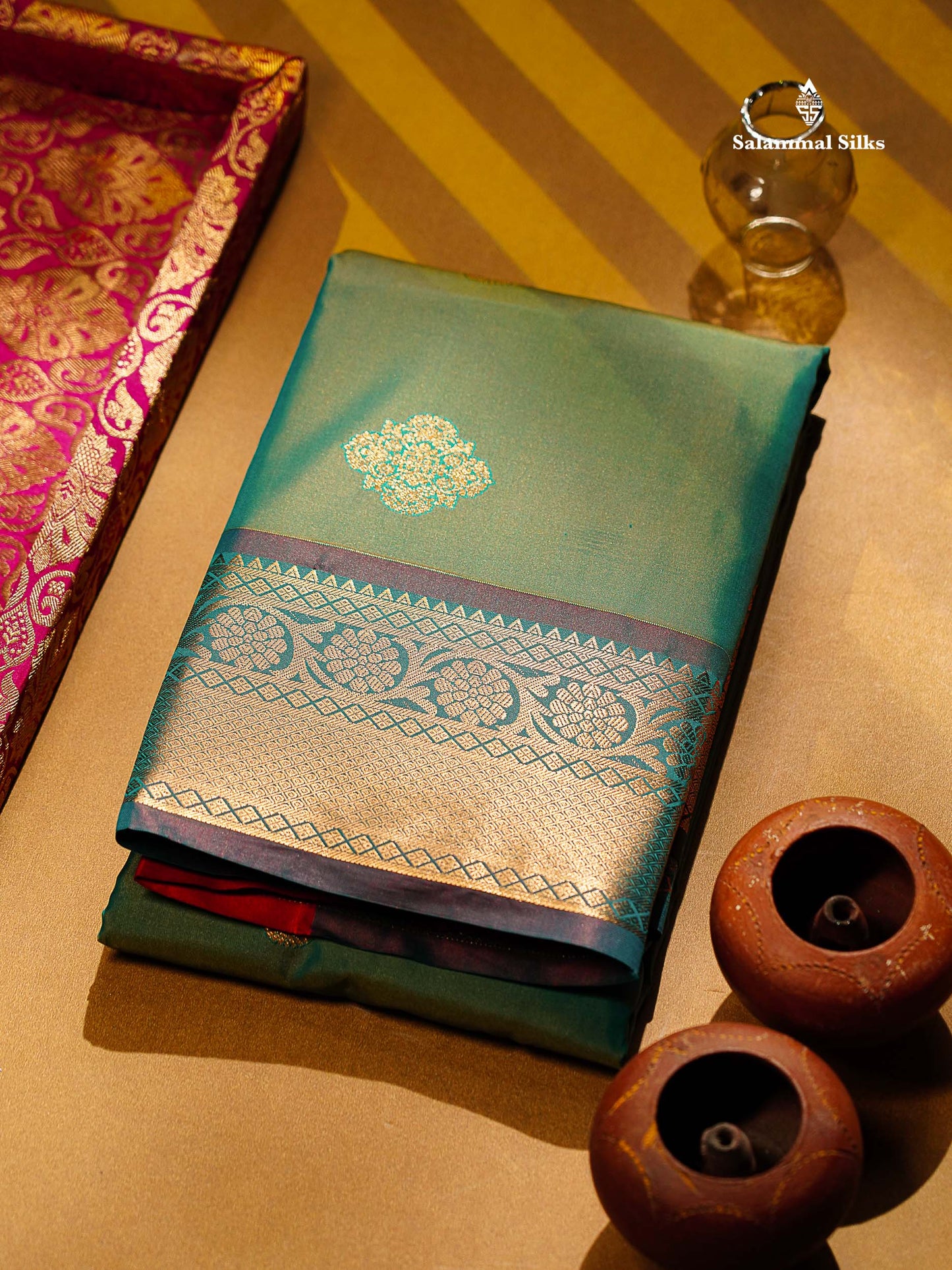 Beautiful Dual Tone Sapphire Green Zari Butta Semi Silk Saree With Contrast Orange Blouse