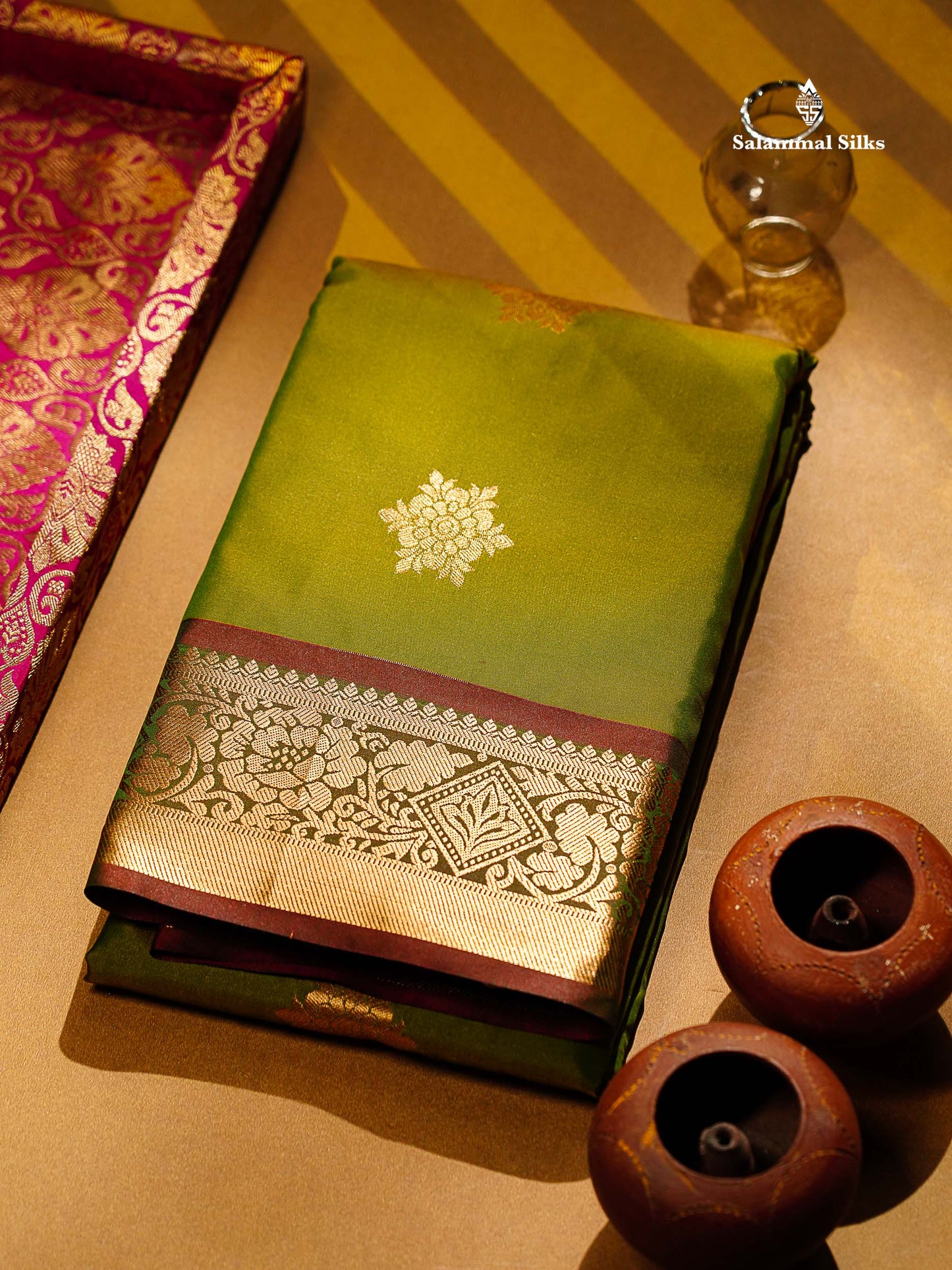 Beautiful Green Zari Butta Semi Silk Saree With Contrast Rust Orange Blouse
