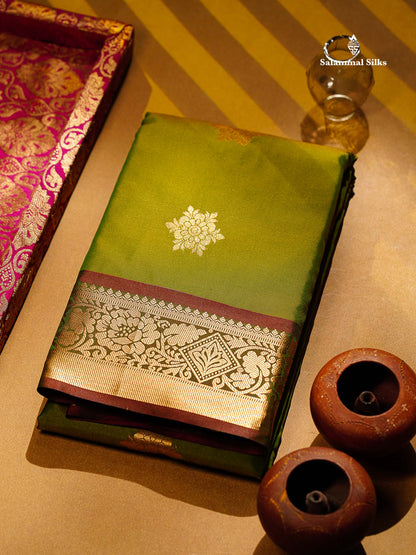 Beautiful Green Zari Butta Semi Silk Saree With Contrast Rust Orange Blouse