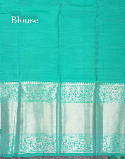 Beautiful Baby Pink Pure Kanjivaram Silk Saree With Contrast Sapphire Green Blouse
