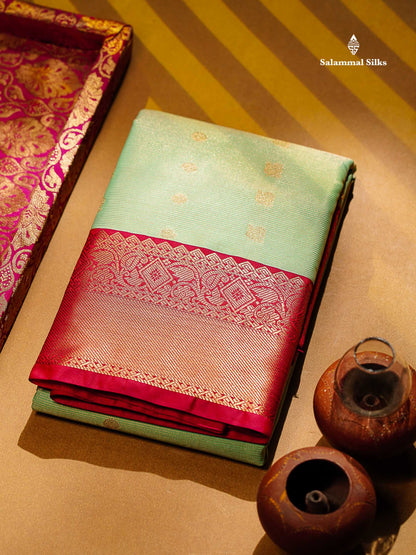 Beautiful Light Green Vaira Oosi Lines With Traditional Buttas Semi Silk Saree With Contrast Pink Traditional Border