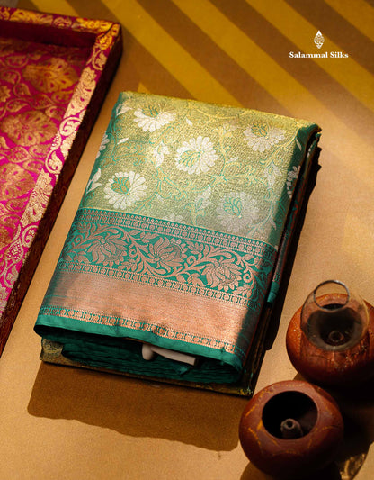 Beautiful Light Green Tissue Bridal Semi Silk Saree With Peacock Green Traditional Border