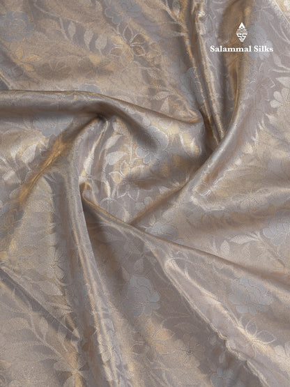 Beautiful Ice Blue Tissue Semi Silk Saree With Traditional Border