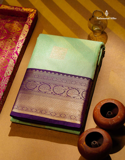 Semi Silk Saree - Rexona Green Butta With Lines Along With Contrast Dark Purple Traditional Border